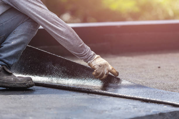 Professional Basement Waterproofing technician working in Stone Mountain, GA